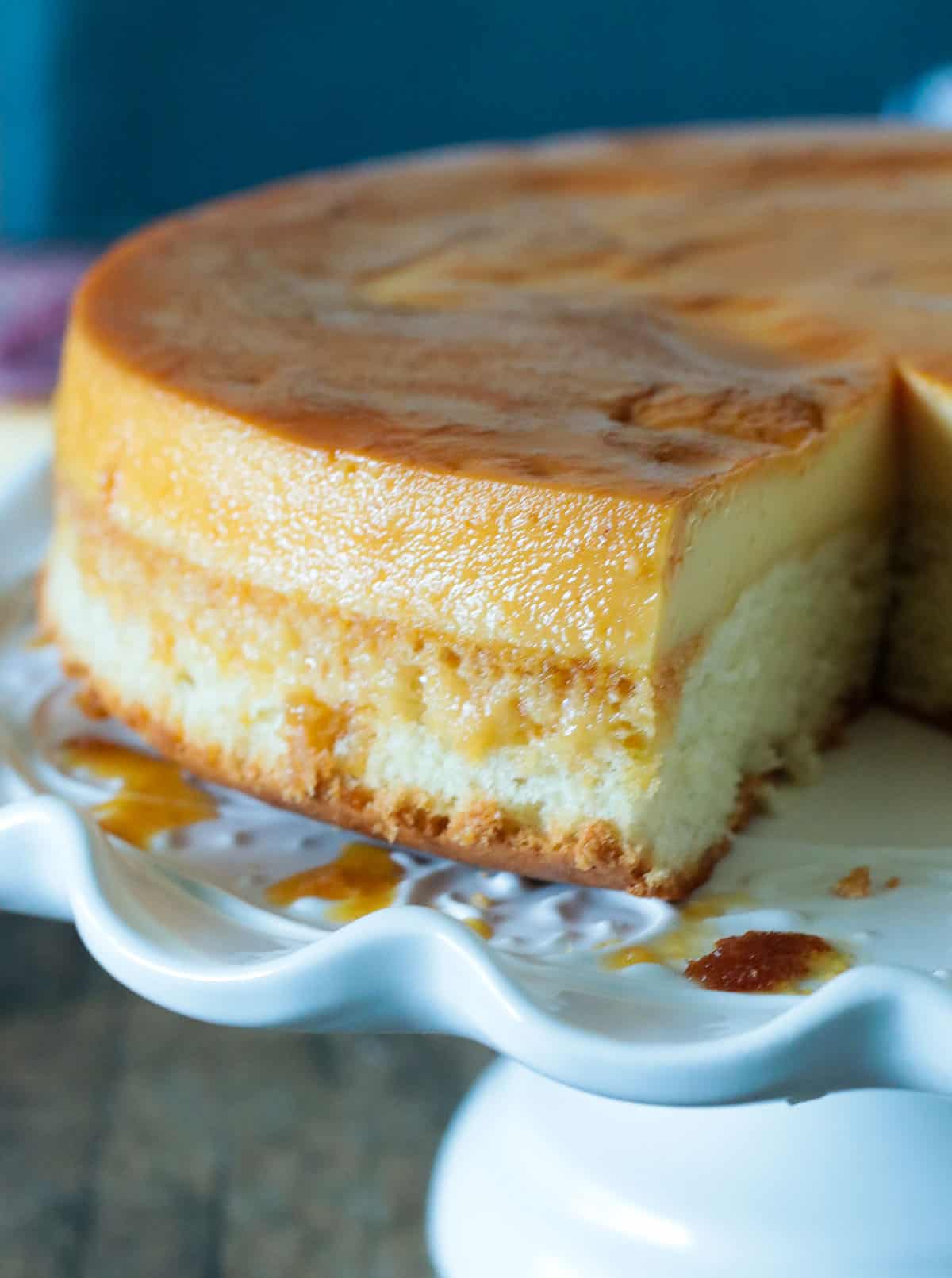 Close up of a sliced custard cake.