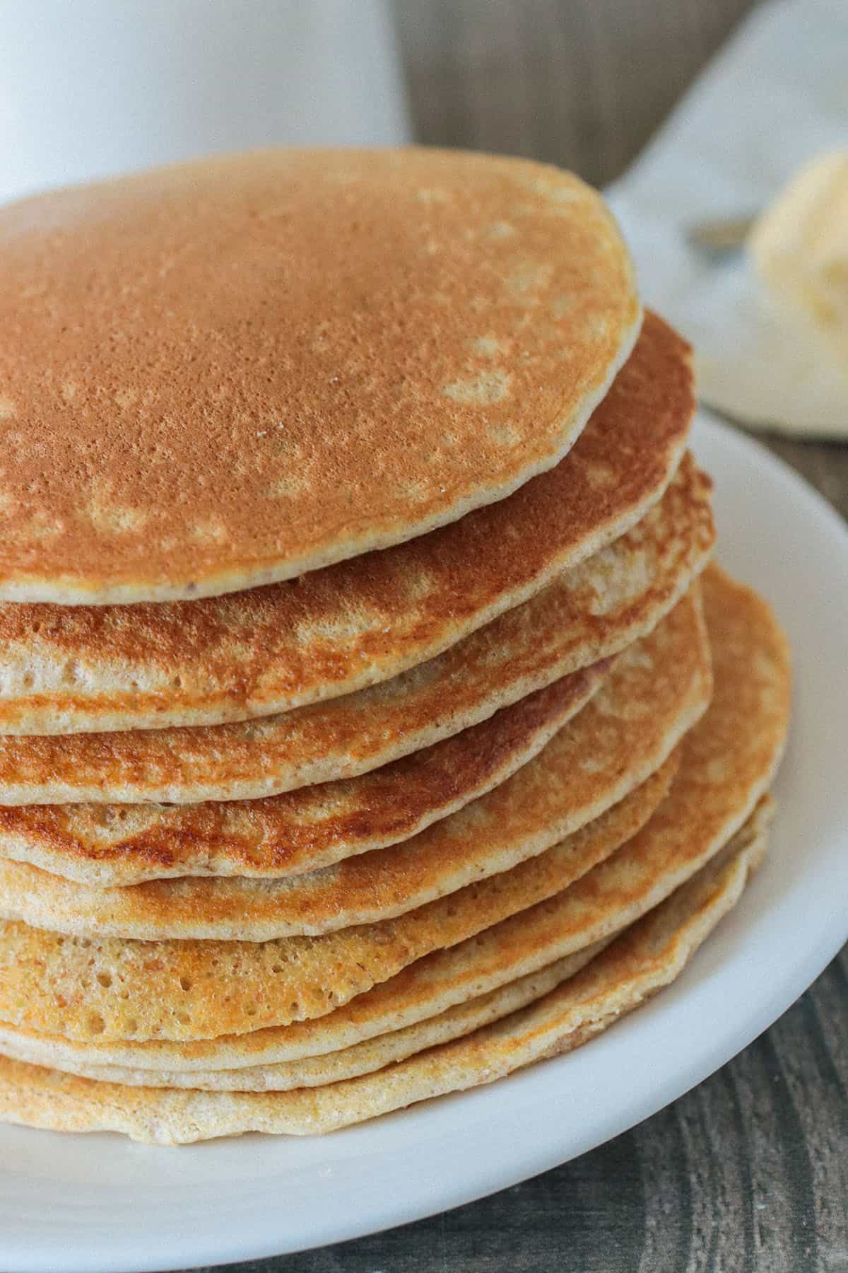 A stack of freshly made whole wheat pancakes.
