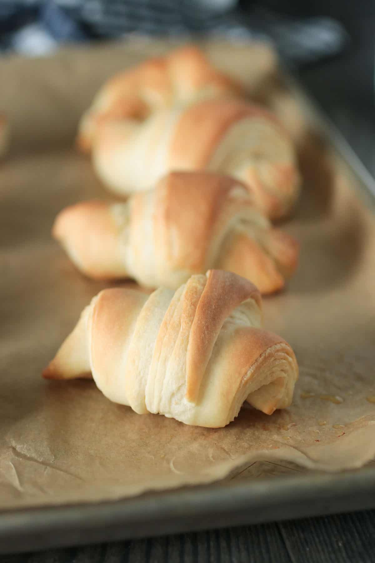 Freshly baked crescent butter rolls.
