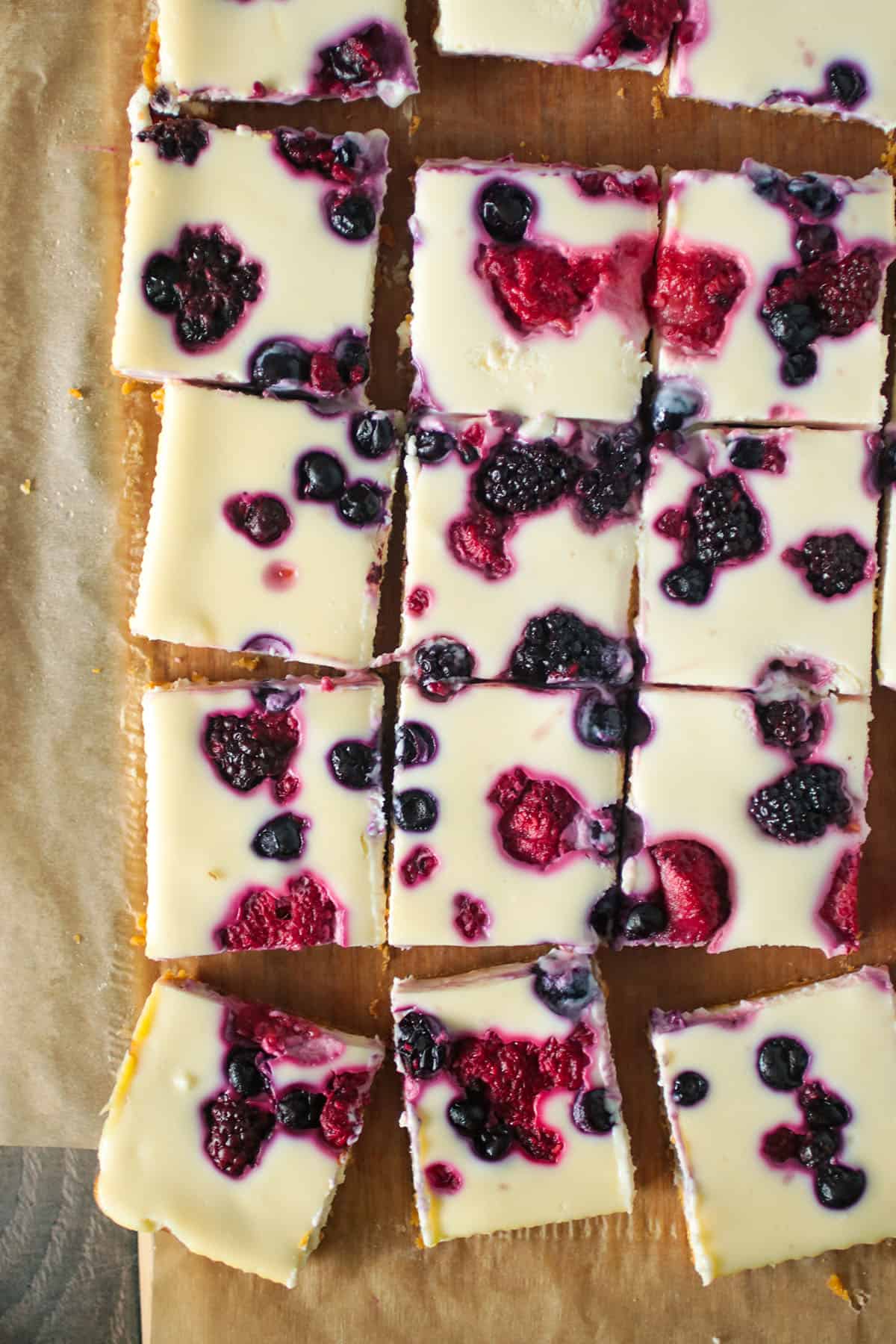 Top shot of triple berry cheesecake bars.