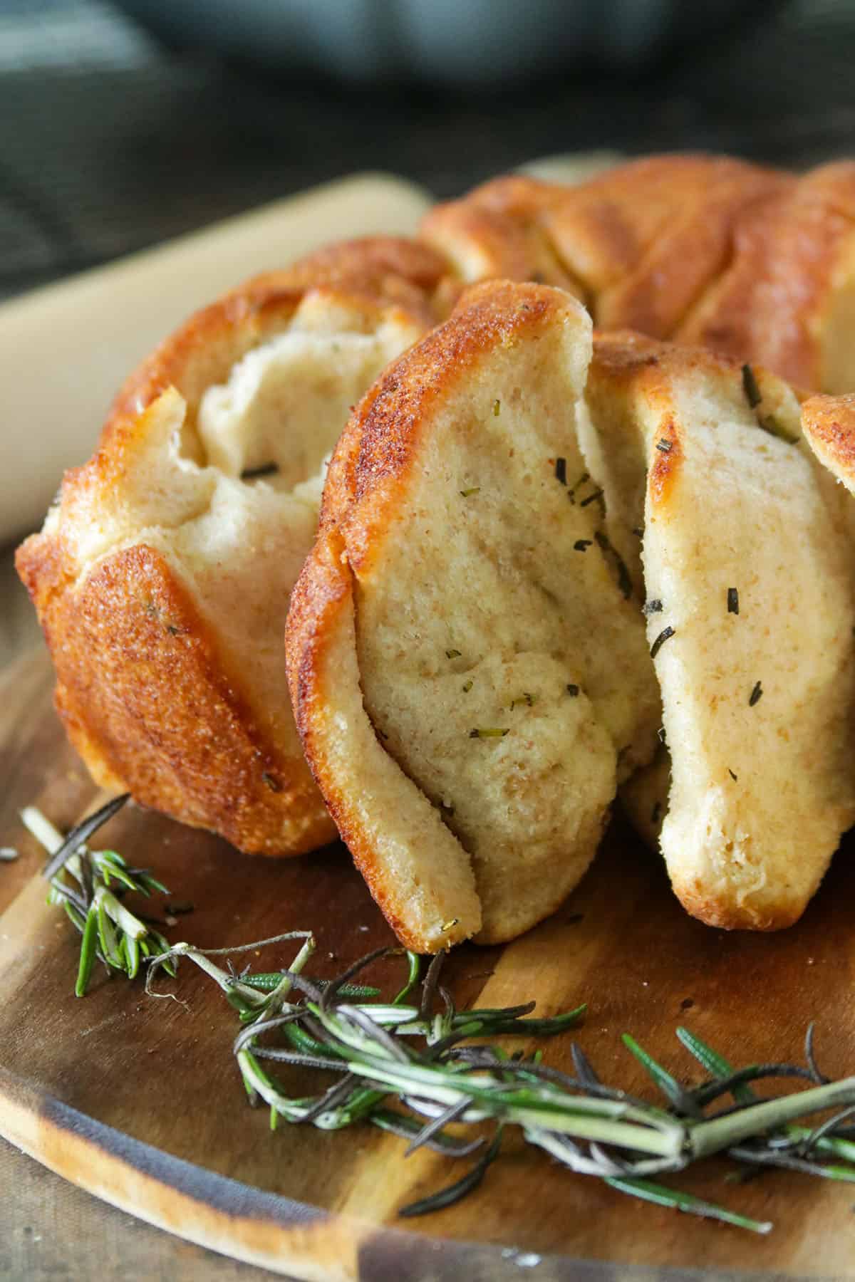 Close up of a slice of the Rosemary Garlic Pull Apart Bread.