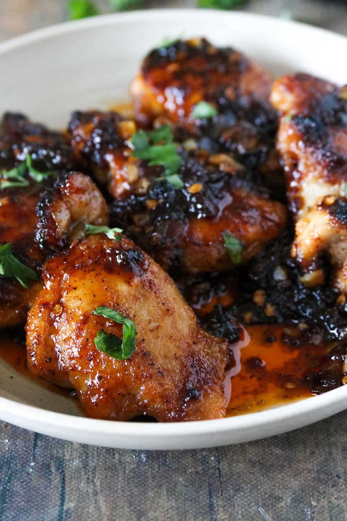 Honey Chipotle Chicken thighs on a plate.