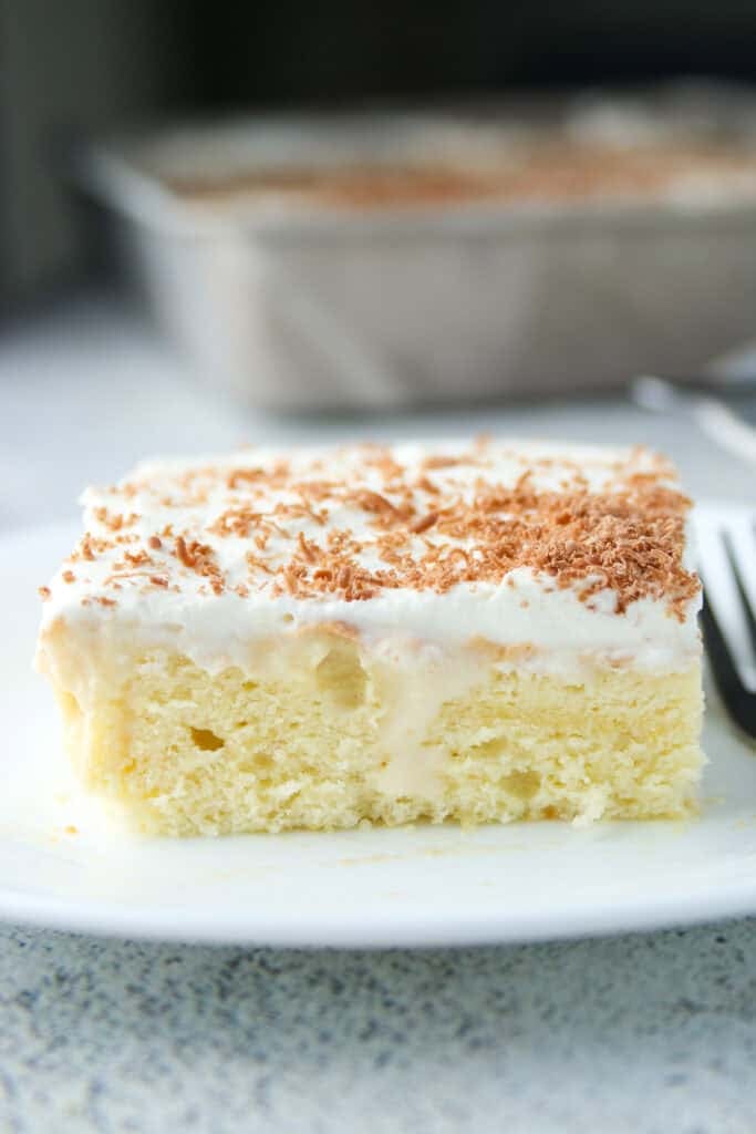 A slice of Tres Leches Cake in plate.