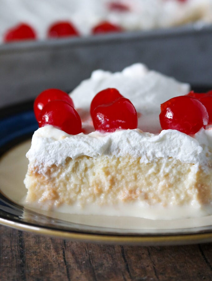 Close up of a slice of Tres Leches cake