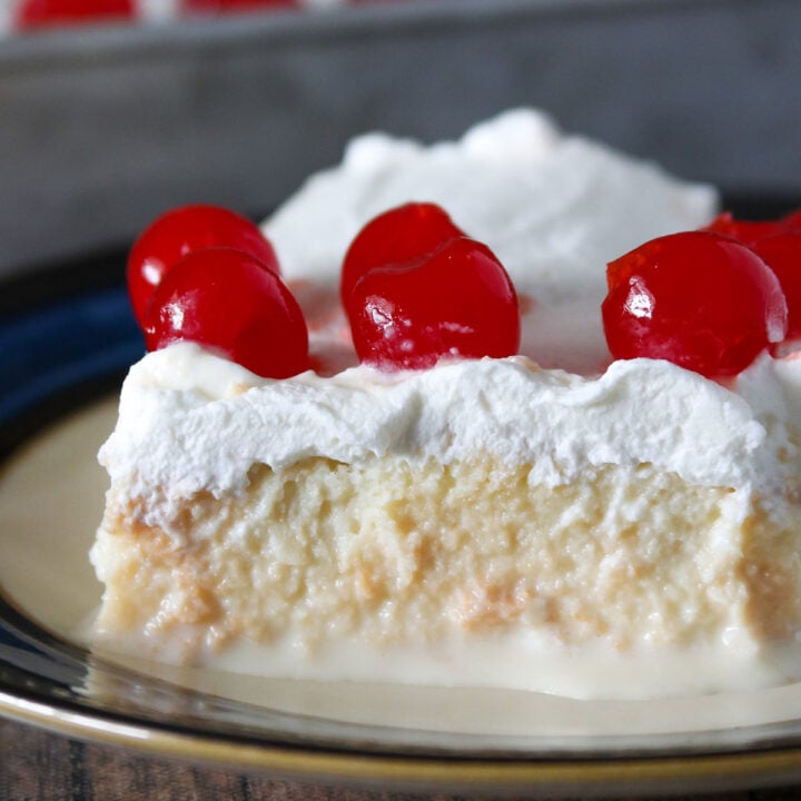 Close up of a slice of Tres Leches cake