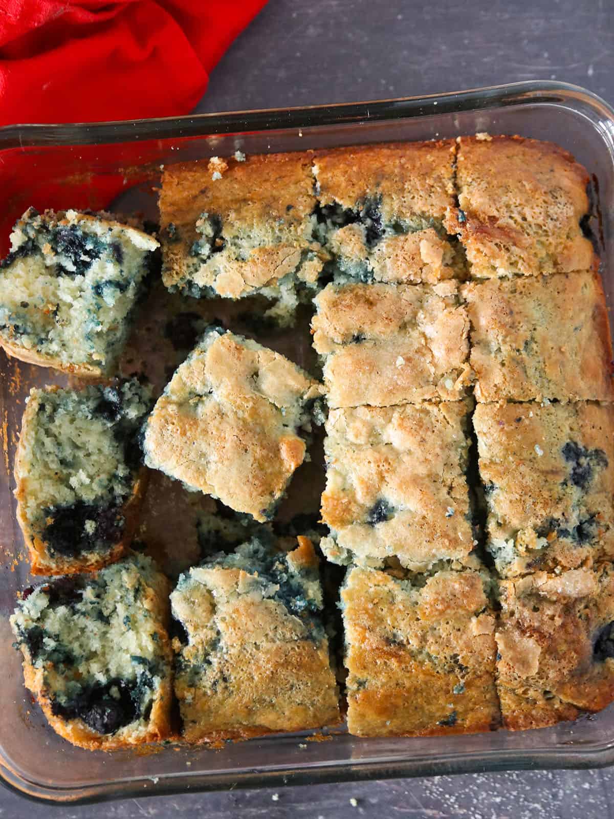 Sliced Blueberry Breakfast Cakes in a baking dish.
