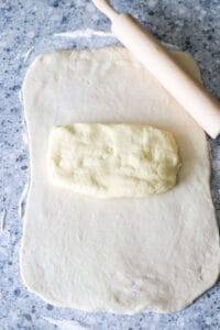 Position of the butter block in the dough before lamination.
