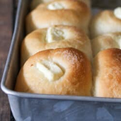 Cream Cheese bread rolls on a baking pan.
