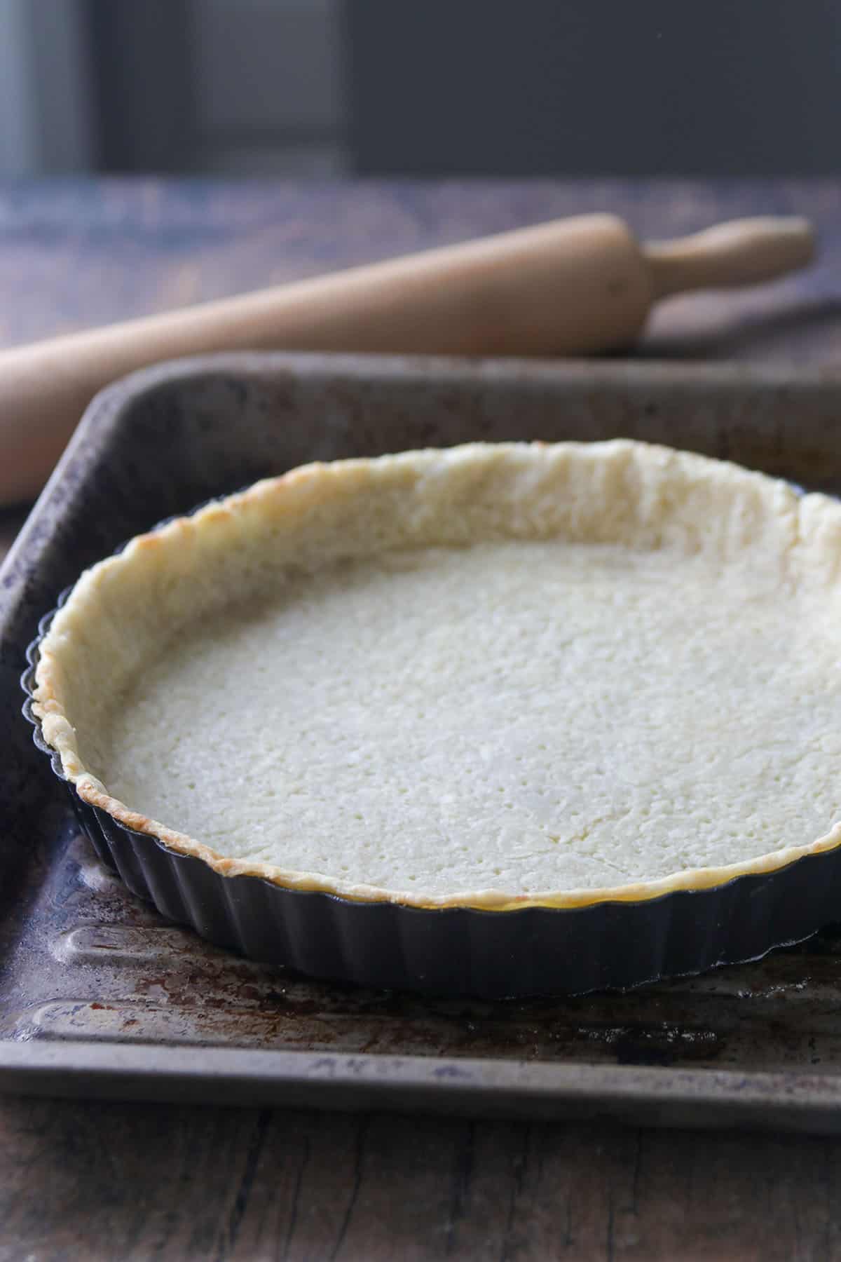 The cream cheese tart crust after blind baking.