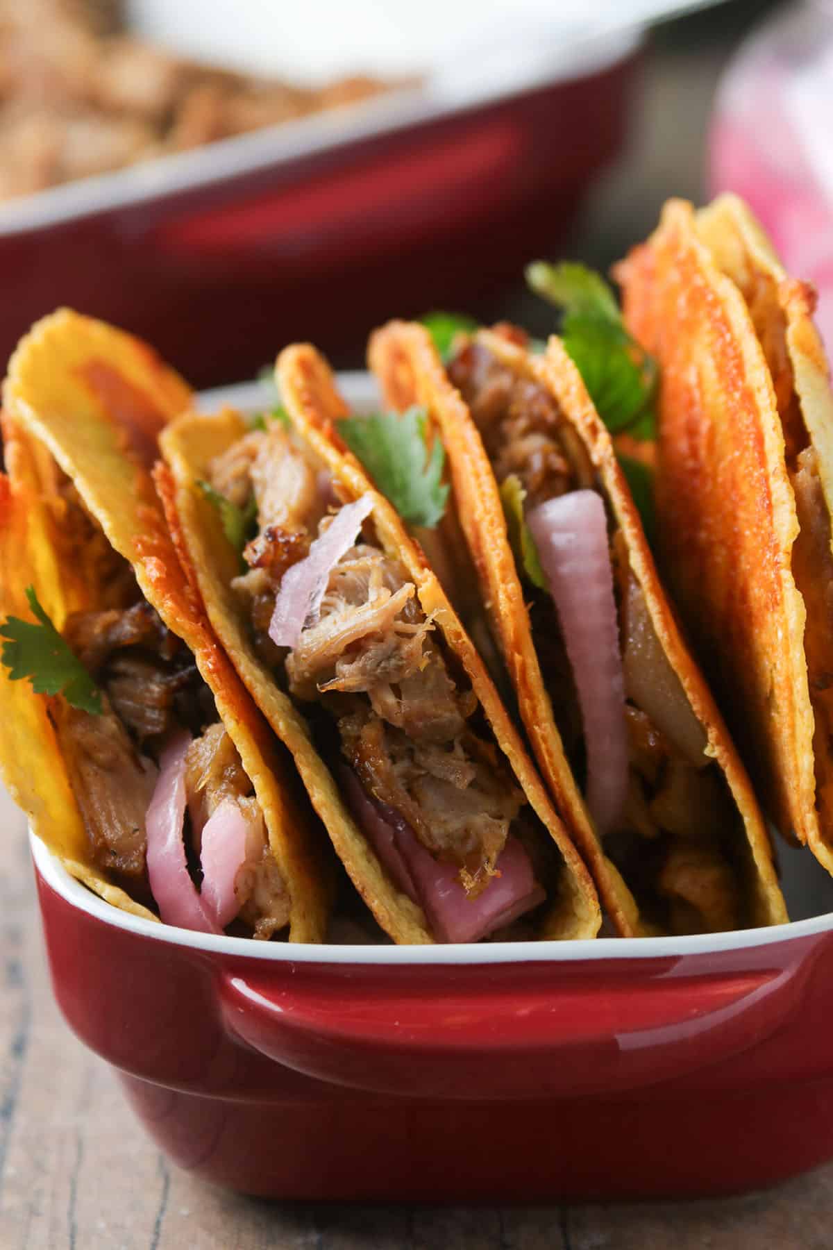 The crispy pork carnitas tacos up close.
