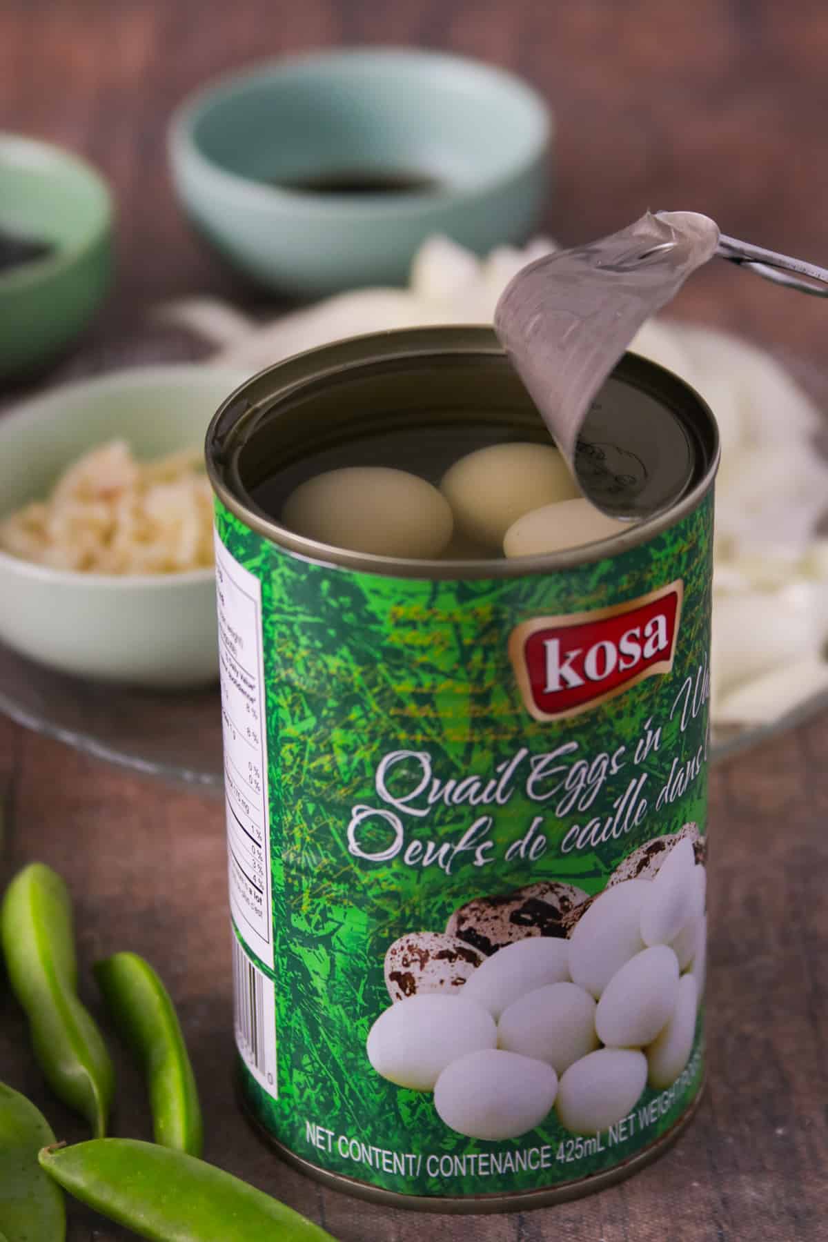 An opened canned quail eggs.
