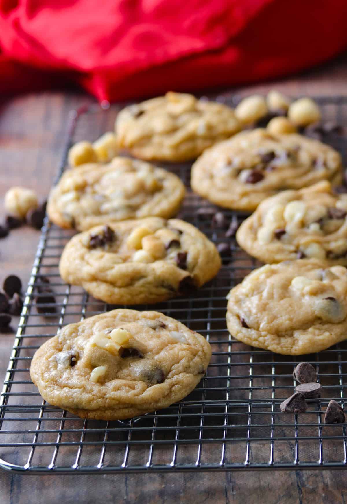 Chocolate Chip Macadamia Nut Cookies on a wire rack.