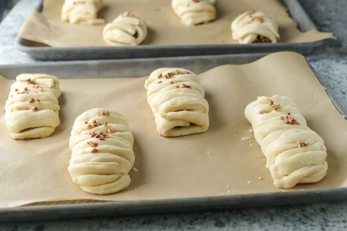 Assembled maple pecan Danish pastries ready for baking.