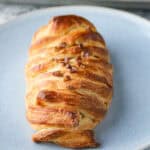 Maple pecan danish pastry in a blue plate.